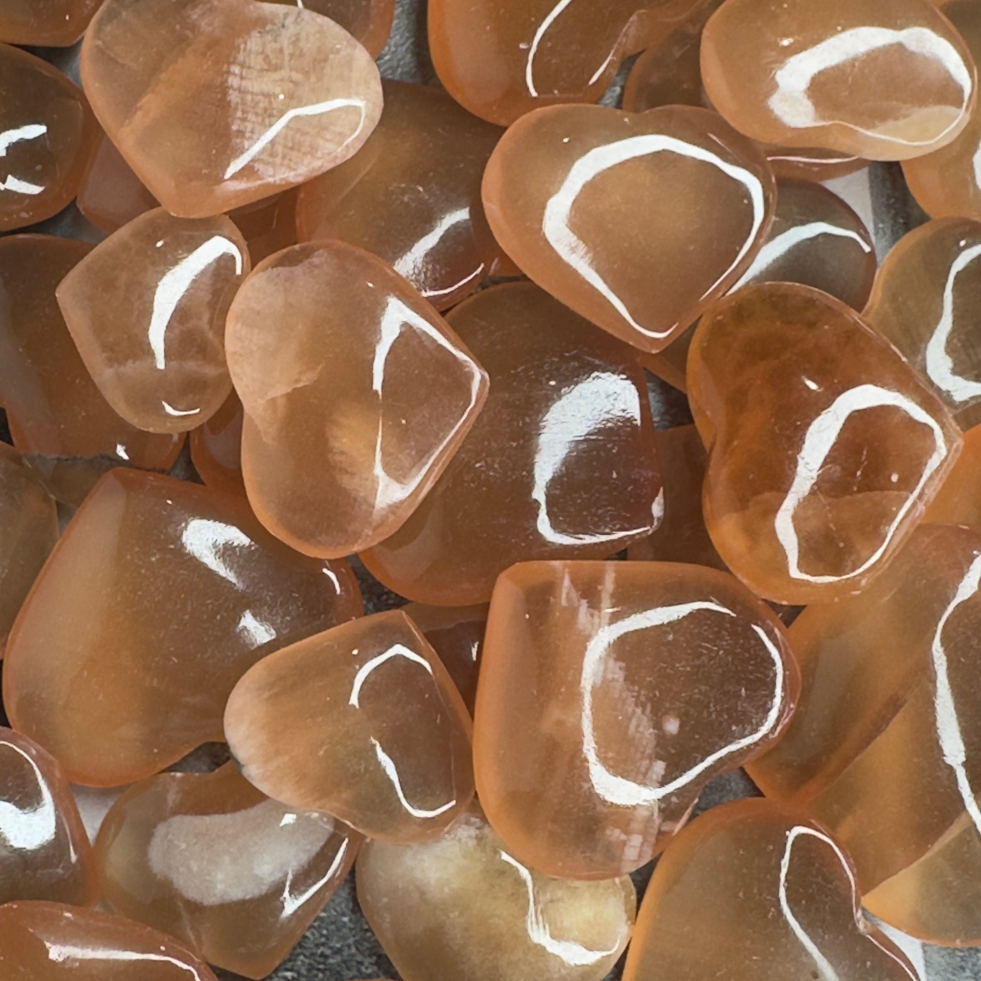 One (1) Captivating Carved Honey Calcite Heart from Pakistan