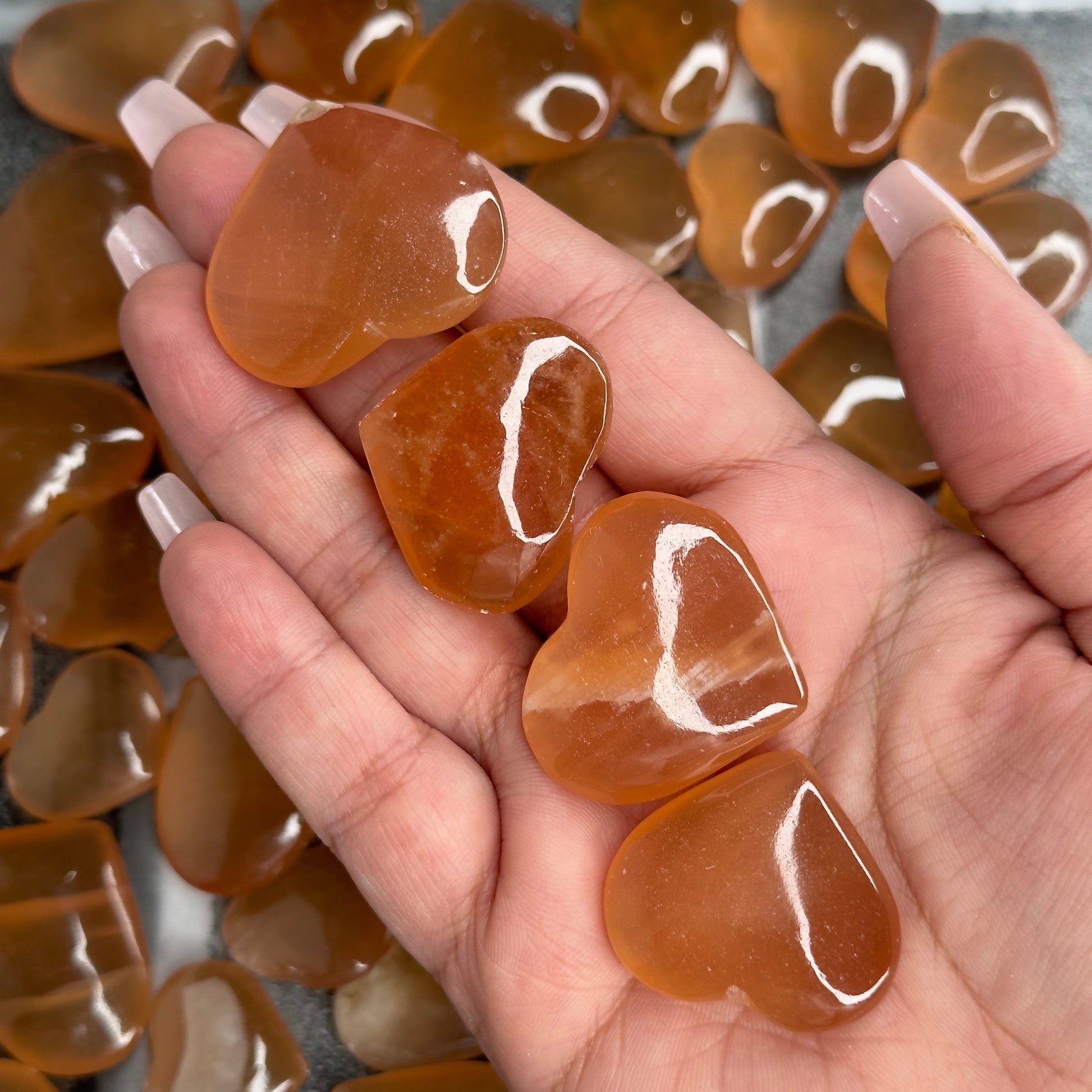 One (1) Captivating Carved Honey Calcite Heart from Pakistan