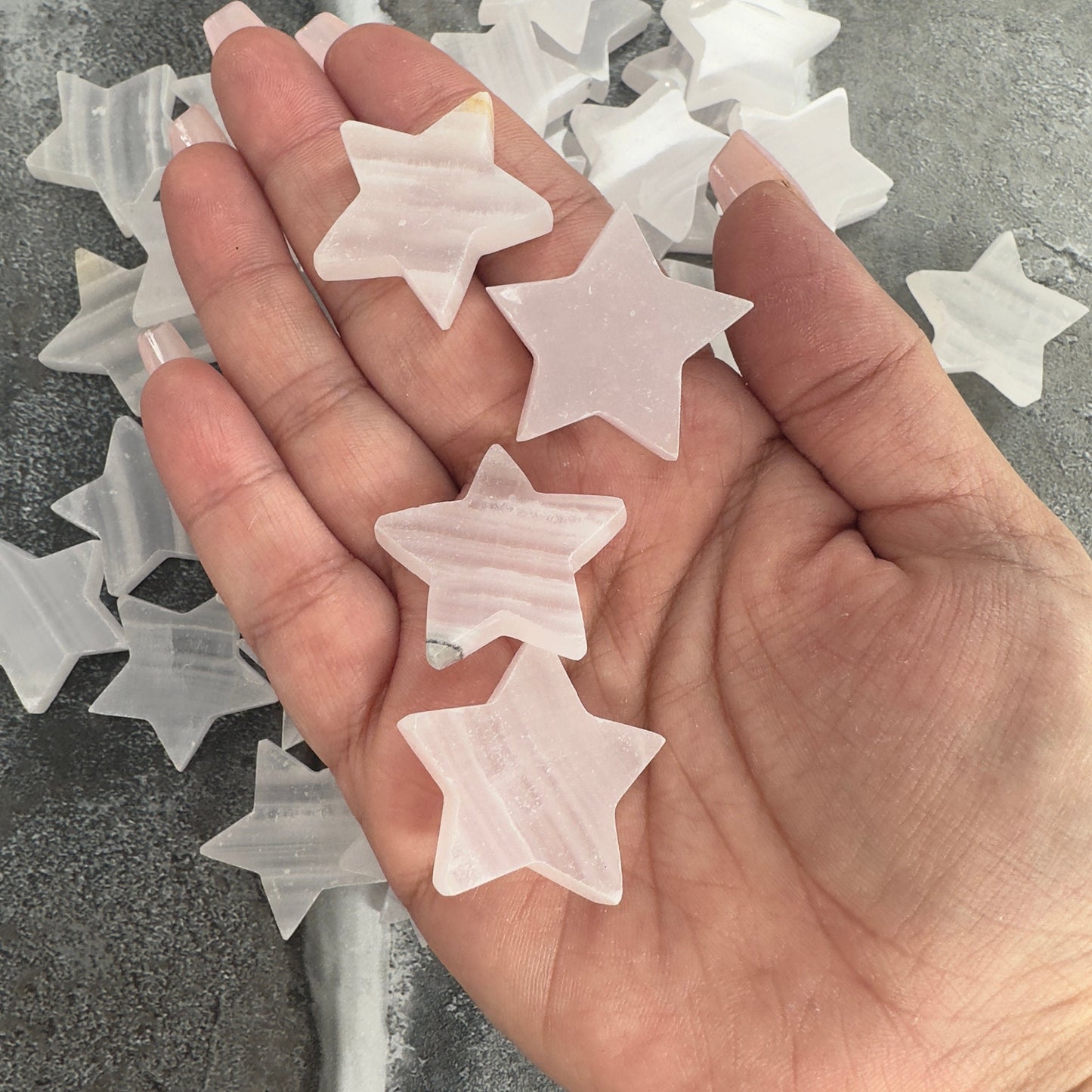 One (1) Charming Carved Pink Calcite Star from Pakistan