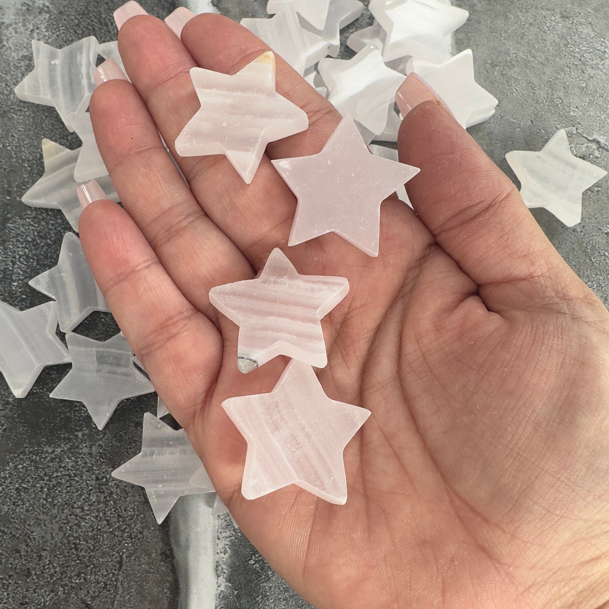 One (1) Charming Carved Pink Calcite Star from Pakistan