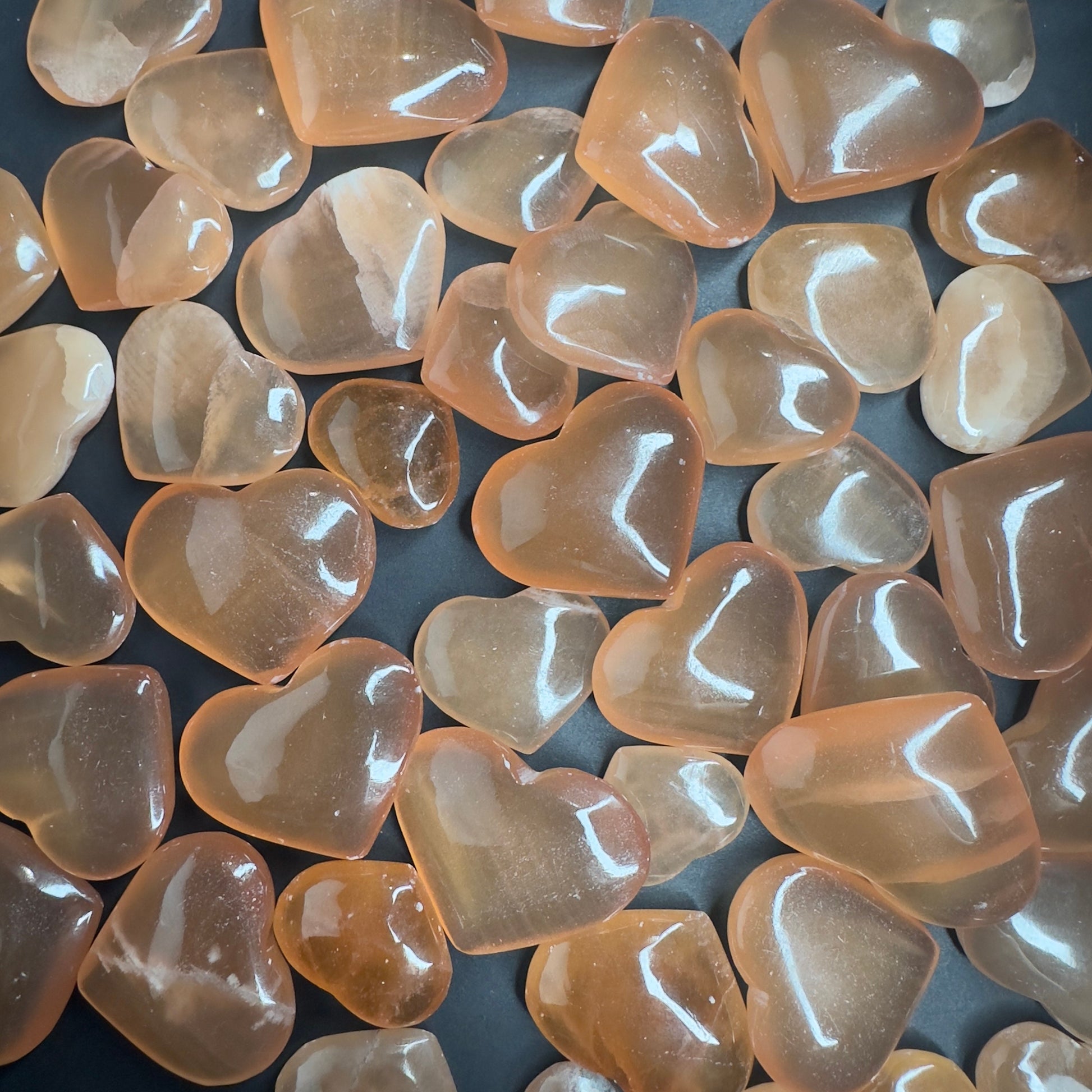 One (1) Captivating Carved Honey Calcite Heart from Pakistan