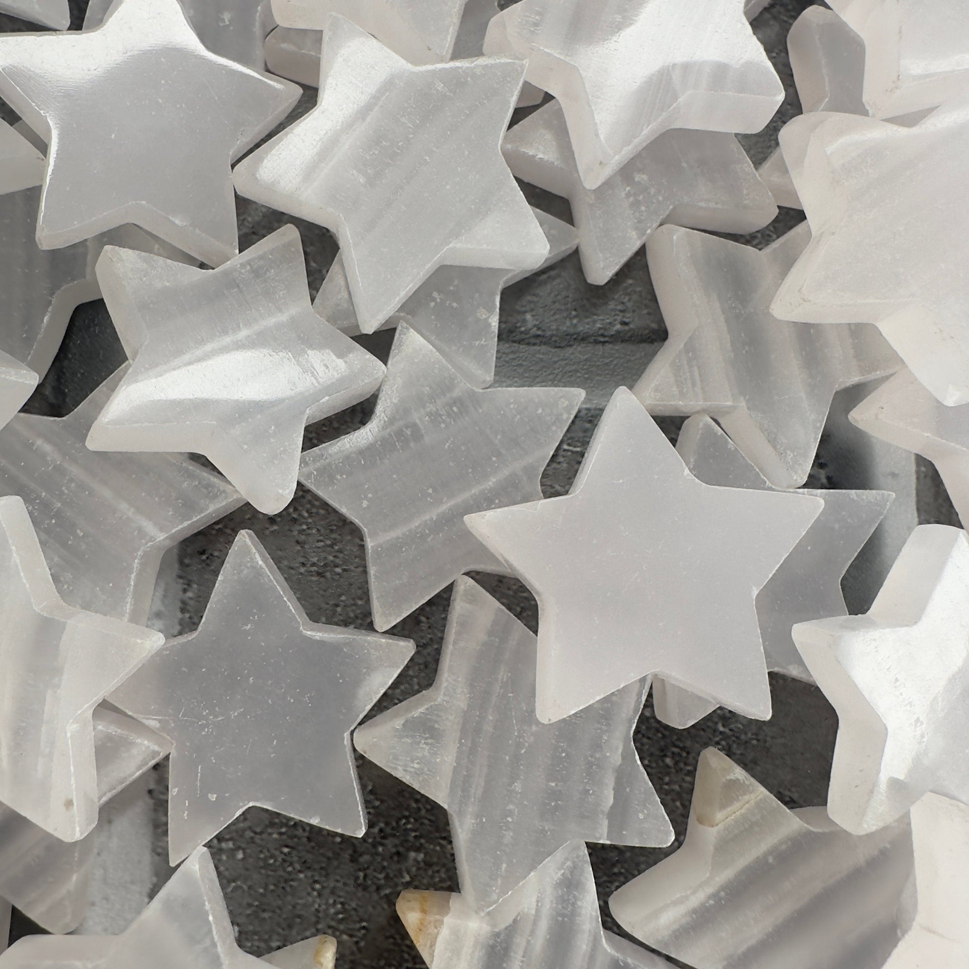 One (1) Charming Carved Pink Calcite Star from Pakistan